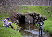 Technician Measuring Stream Discharge 1